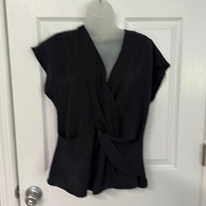 Express black flutter sleeve blouse. NWOT size M.
